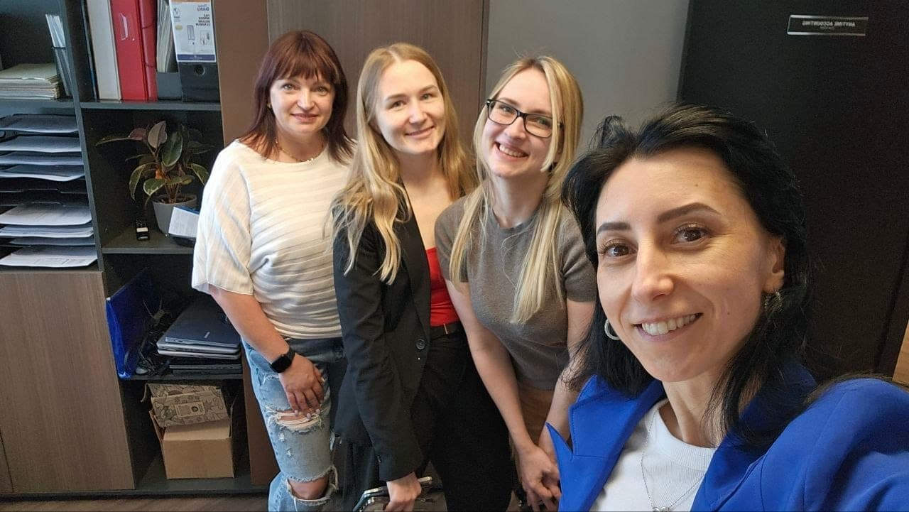 Olha Vozna with colleagues at the Anytime Accounting office