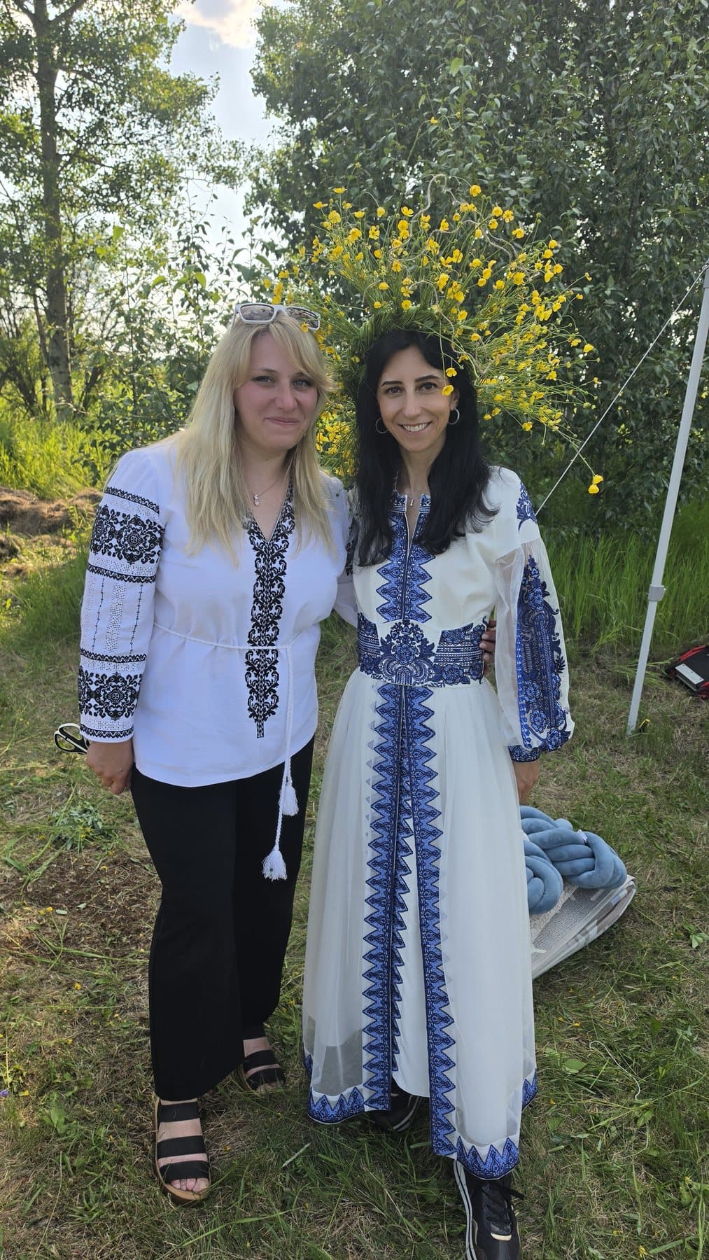 Olha Vozna and a festival guest wearing Ukrainian embroidered clothing